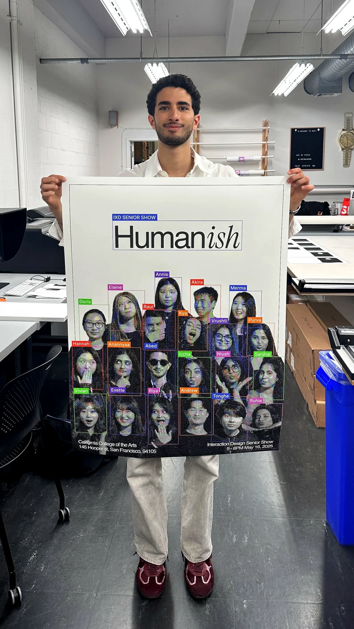 Abed holding the poster